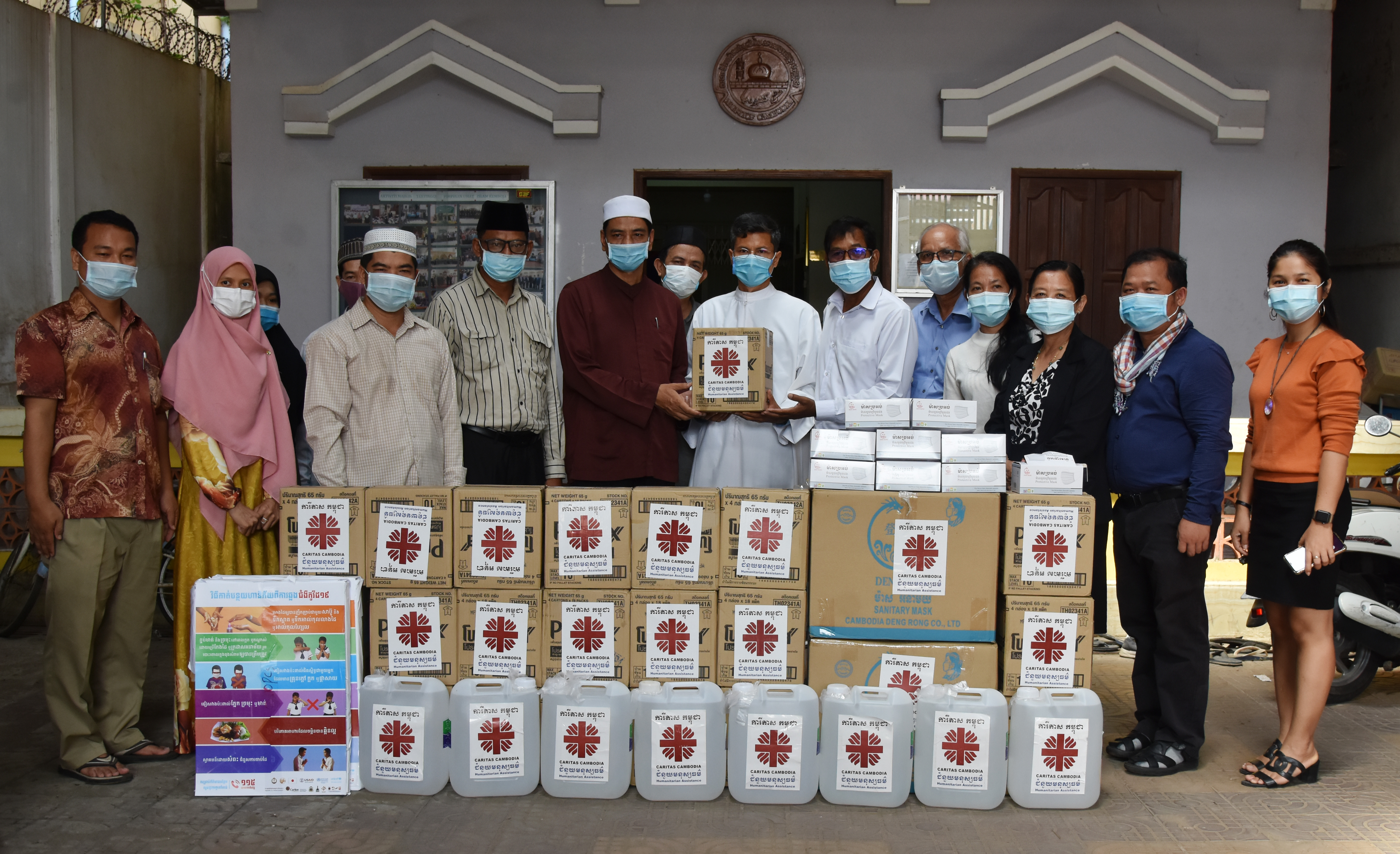 Caritas Cambodia donates medical supplies to Muslim and Buddhist communities.