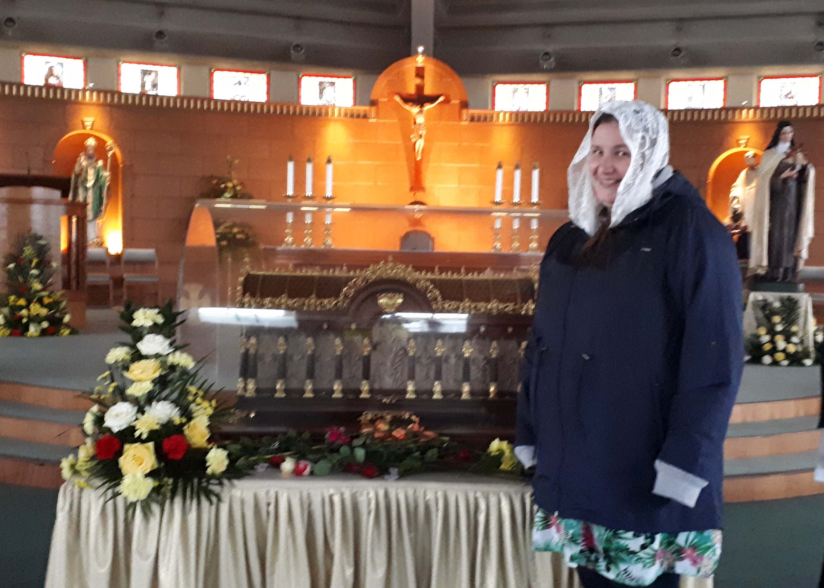 Elena beside a reliquary of St. Therese of Lisieux in Scotland in the fall of 2019