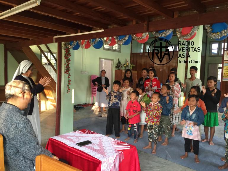The Children wished the bishop with Christmas songs and also gave him beautiful flower-pots.