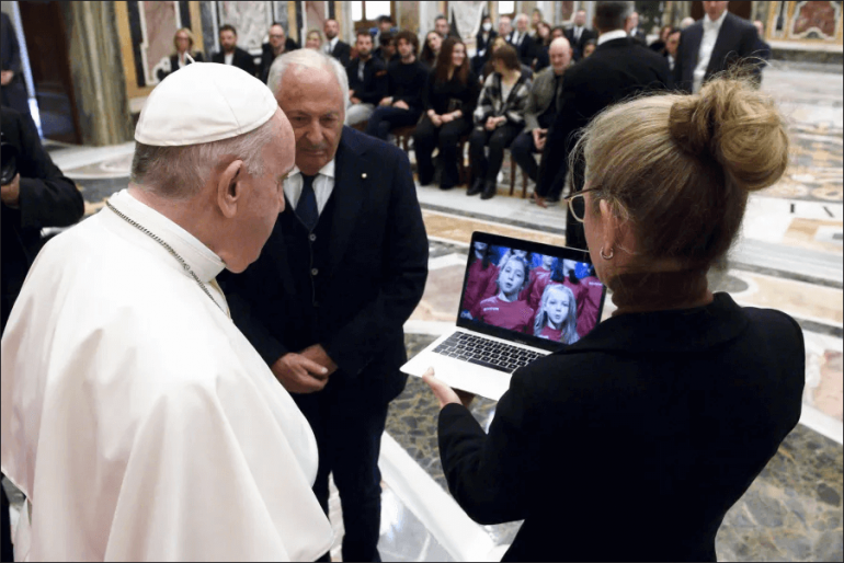 Pope Francis met participants in a Christmas song contest initiative at the Vatican on Nov. 22, 2021