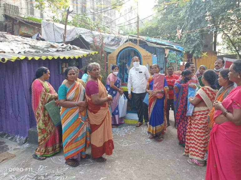 St. Vincent de Paul Society members distributed clothes to more than 100 needy families in the slum area in the vicinity of Maharani Peta St. Anthony's church in Visakhapatnam Archdiocese, Andhra Pradesh, India.
