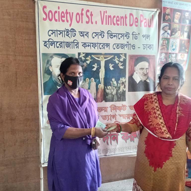 St. Vincent De Paul Society shares Christmas gifts to the poor at Tejgaon Holy Rosary Church