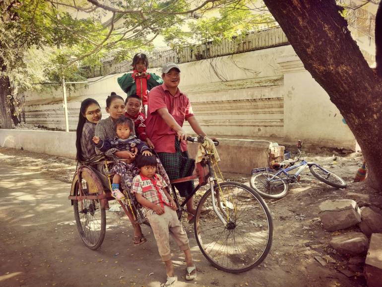 Homeless with a heart even near a garbage dump Nay Aung and Khin Mar Oo’s family collects garbage for daily living on the 24th street in Mandalay, Myanmar. Nay Aung is raising five children, instilling a sense of hard work and honesty in them.