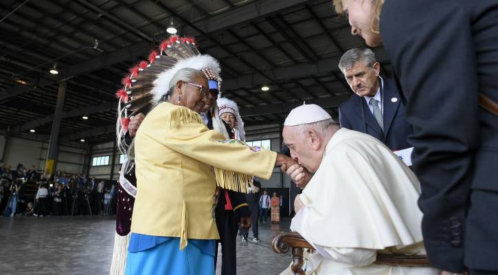 Pope Francis Kisses hand of Canadian