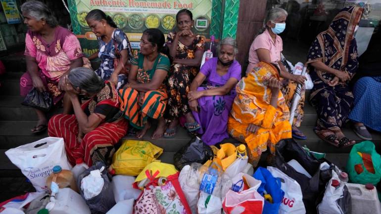 Sri Lankan women waiting to buy supplies