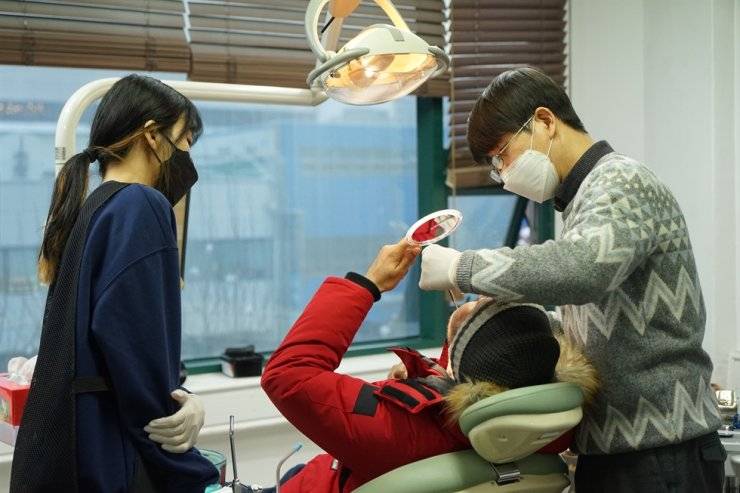 The Korean catholic dental care group in Action