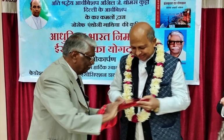 Author Gathia with Delhi Archbishop Anil Couto