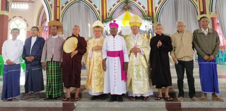 Monsignor Joseph Soosay is with two Bishops, two Buddhist Monks and some Protestant Leaders