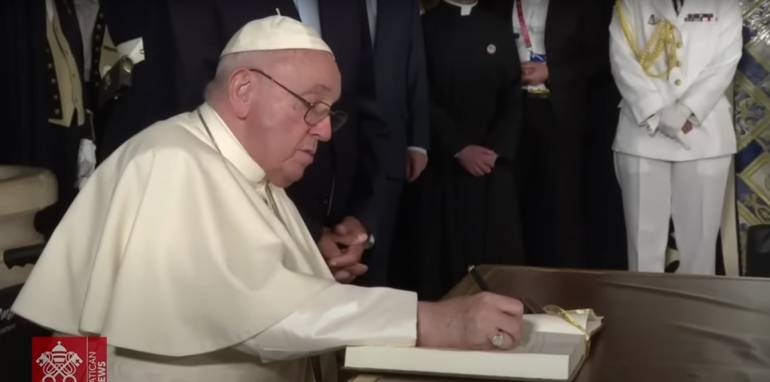 Attached photo screencap from Vatican News: Lisbon, Welcome Ceremony, 2 August 2023, Pope Francis - YouTube