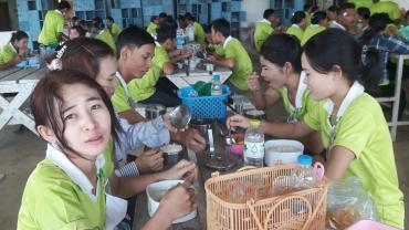 Eating meal in the dining room of the factory