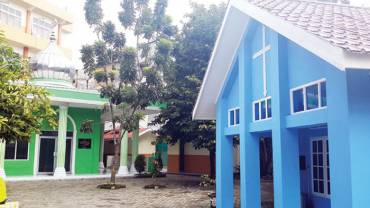 A private school with four houses of worship on its campus promotes diversity and tolerance among students in Indonesia.