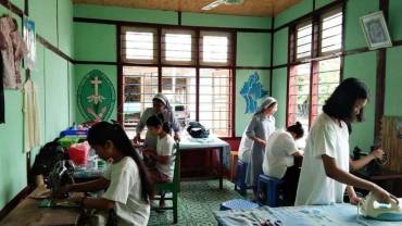 Young women in Myanmar enroll to learn a new tailoring skill amid sacristy, pandemic, and political turmoil.