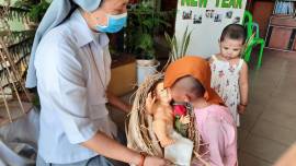 Catholic nuns in Myanmar celebrated Christmas with Buddhist children in Haling Thar Yar and vendors in Mayangone Townships in Yangon on December 24.