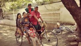 Nay Aung and Khin Mar Oo’s family collects garbage for daily living on the 24th street in Mandalay, Myanmar. Nay Aung is raising five children, instilling a sense of hard work and honesty in them. 