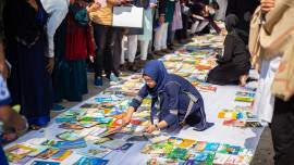 People of all ages in Rajshahi city met at the festival to get free books to mark International Mothers Language Day at Circuit House Road in Rajshahi on February 21.