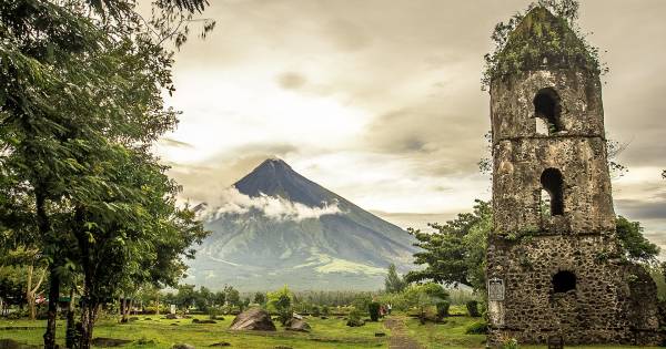 Centuries-old surviving church tower in Philippines draws pilgrims, tourists