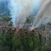 aerial shot thantlang building destroyed by shelling from junta